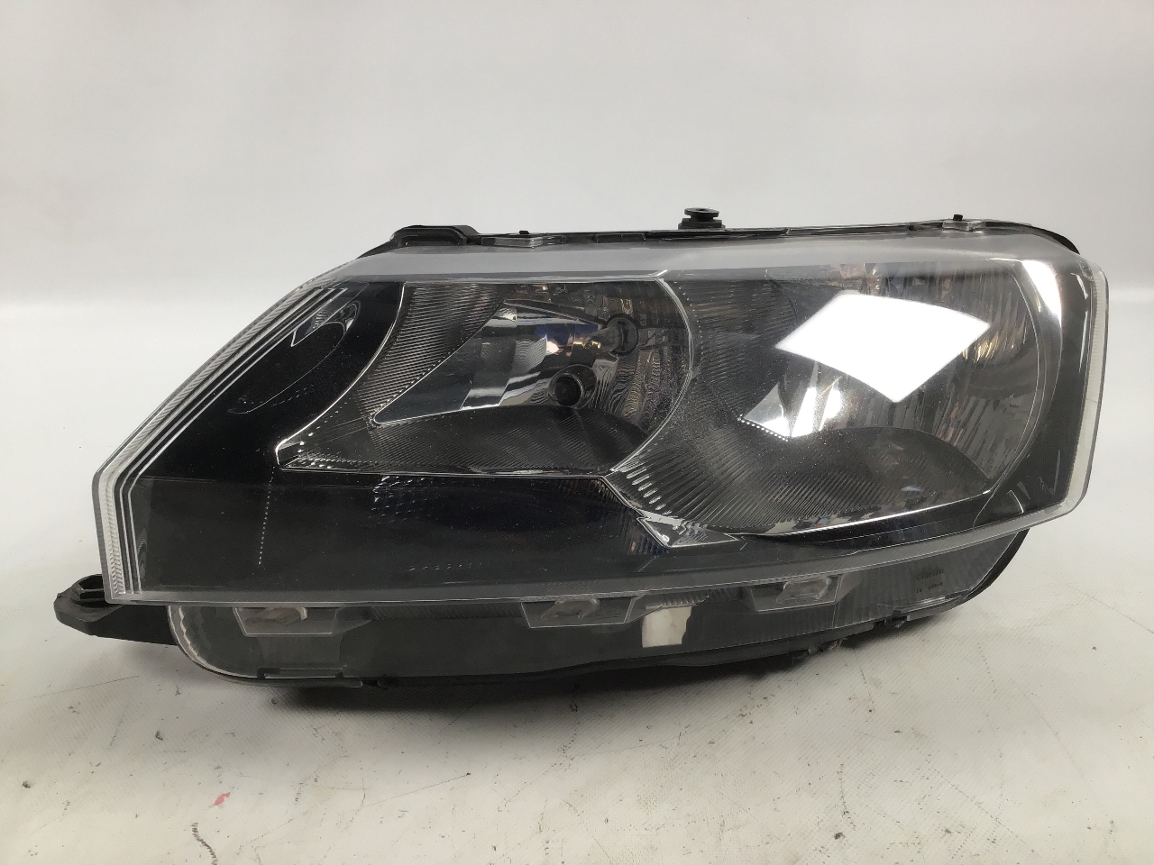Koplamp links SKODA Rapid (NH) 1.6 TDI  77 kW  105 PS (07.2012-> )