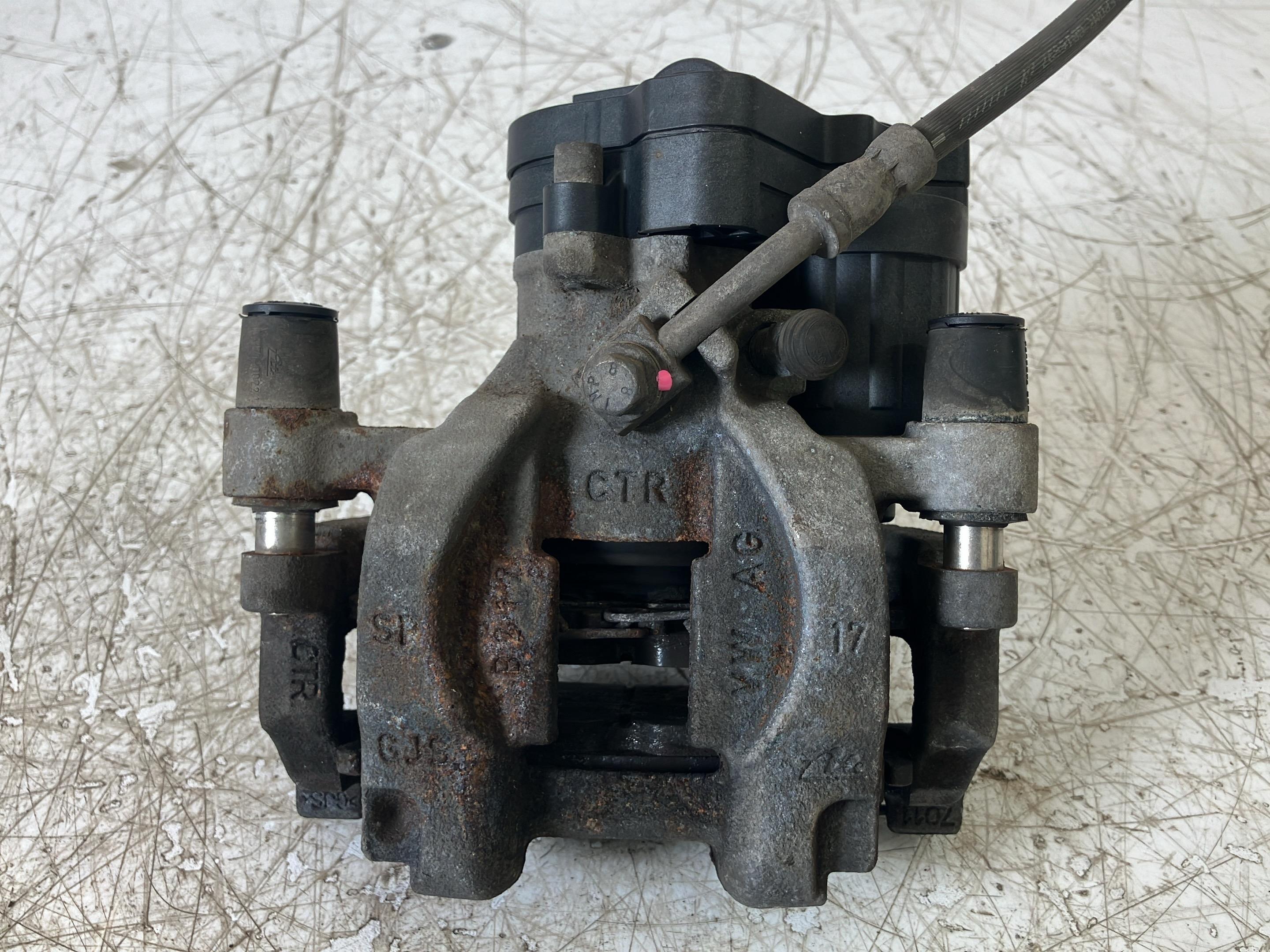 Brake caliper left rear VW Tiguan II (AD) 1.5 TSI  110 kW  150 PS (11.2018-> )